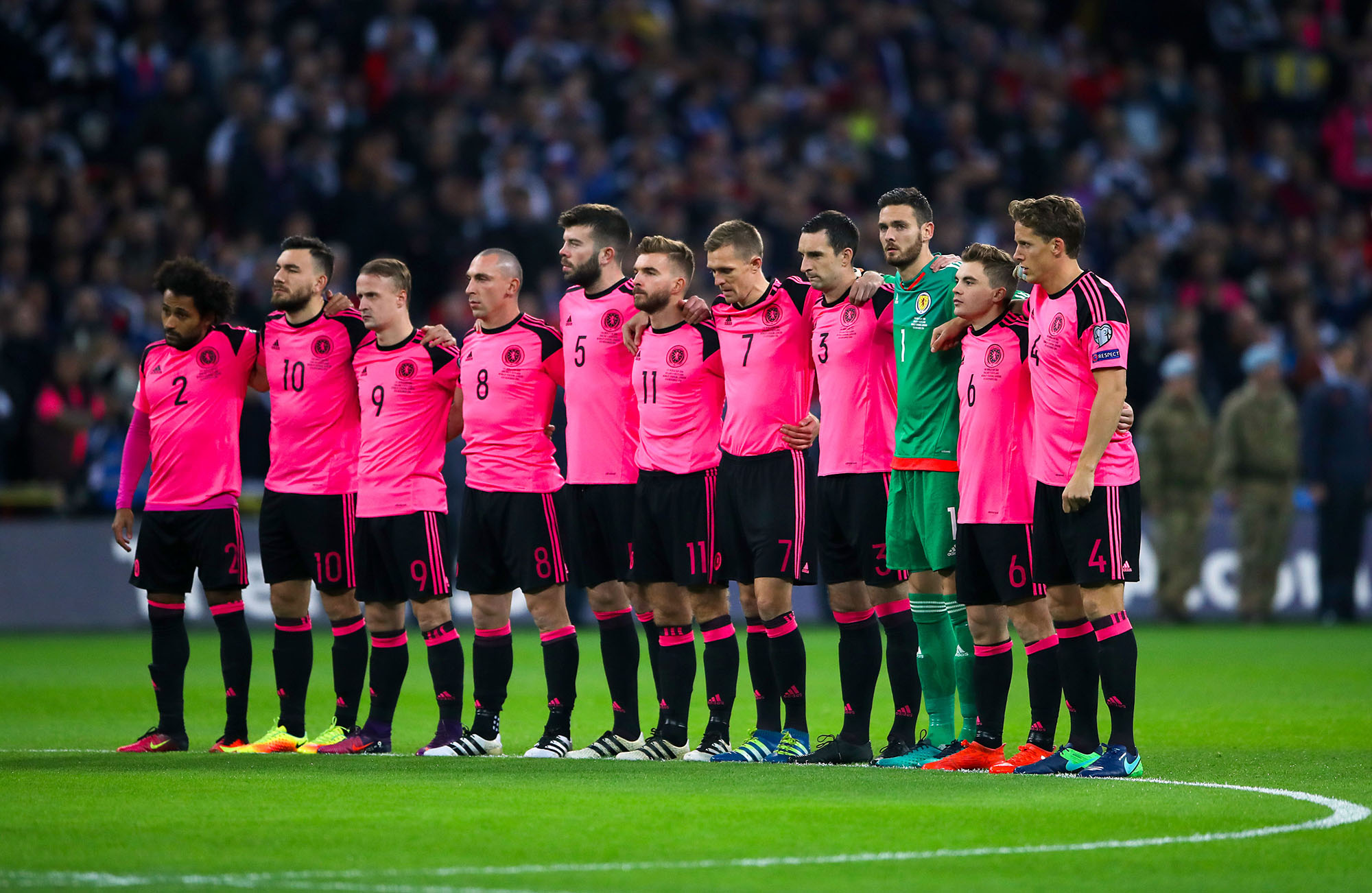 The Scotland team look on during Armistice Day tributes prior to the 2018 FIFA World Cup qualifying, Group F match at Wembley Stadium, London. Photo : Nick Potts / PA Images / Icon Sport