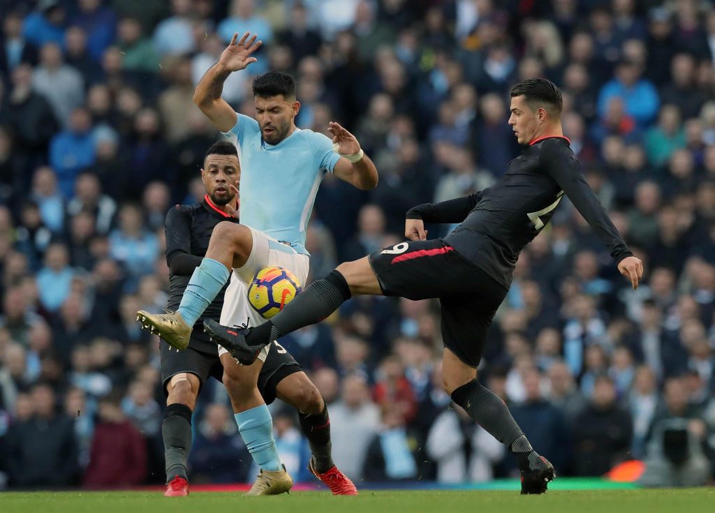 Granit Xhaka tackles Sergio Aguero, Arsenal vs. Manchester City