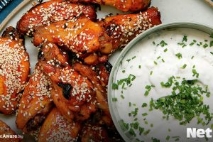 Buffalo wings with blue cheese dip is a must-have Super Bowl party food